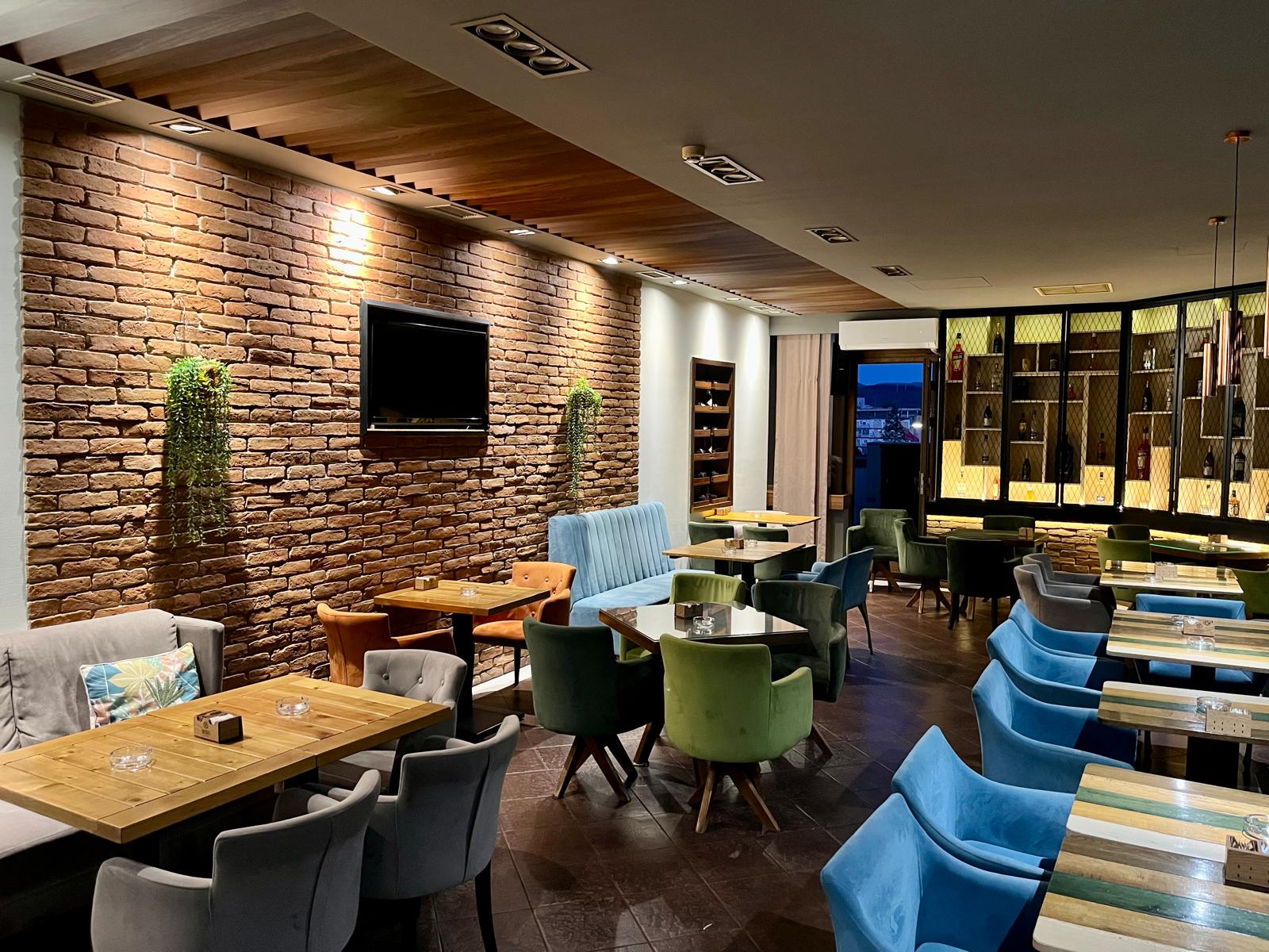 Interior lounge with brick wall